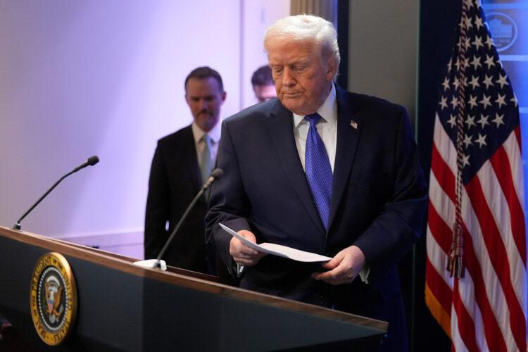 President Donald Trump walks up to the podium to speaks with reporters in the James Brady Press Briefing Room at the White House, Friday, Feb. 20, 2026, in Washington. (AP Photo/Alex Brandon)