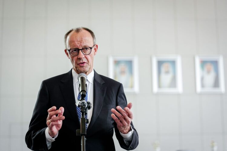 German Chancellor Friedrich Merz makes a press statement on the fringes of his visit to the Abu Dhabi National Oil Company. After Saudi Arabia and Qatar, the United Arab Emirates (UAE) is the third and final stop on the Federal Chancellor's trip to the Gulf region. Photo: Kay Nietfeld/dpa