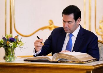 U.S. Secretary of State Marco Rubio writes in a guest book during his meeting with Slovakia's President Peter Pellegrini at the Presidential Palace in Bratislava, Slovakia, Sunday, Feb. 15, 2026.     Alex Brandon/Pool via REUTERS