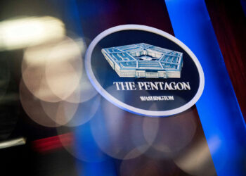 FILE PHOTO: The Pentagon logo is seen behind the podium in the briefing room at the Pentagon in Arlington, Virginia, U.S., January 8, 2020. REUTERS/Al Drago/File Photo