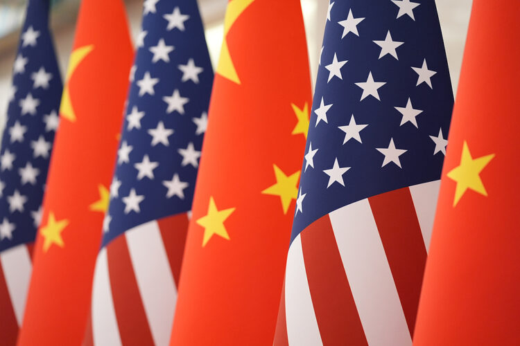 The U.S. and Chinese flag at the Great Hall of the People prior to the state dinner of President Donald Trump and Chinese President Xi Jinping on Thursday May 14, 2026, in Beijing. (AP Photo/Mark Schiefelbein)