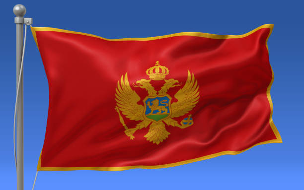 Montenegro flag waving on the flagpole on a sky background