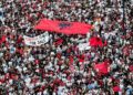 A drone view shows protesters gathered outside the Prime Minister's Office in Tirana, Albania, on June 10, 2026, during the tenth consecutive day of demonstrations against a proposed luxury tourism development project linked to Jared Kushner. Organizers say thousands of people attend the rally. (Photo by Vlasov Sulaj/NurPhoto via Getty Images)