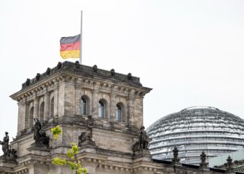 The German flag at the Reichstag building, home of the German Bundestag, flying at half-mast. Photo: Fabian Sommer/dpa