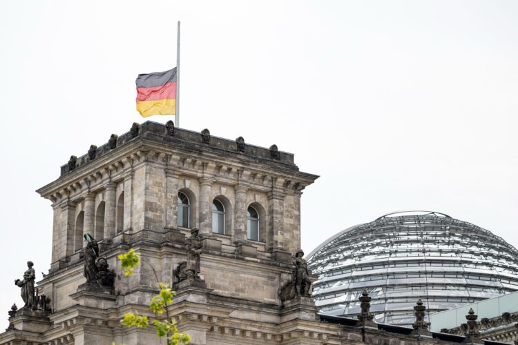 The German flag at the Reichstag building, home of the German Bundestag, flying at half-mast. Photo: Fabian Sommer/dpa