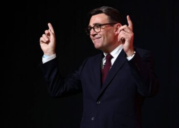 Andy Burnham gestures after being confirmed as the Labour Party's new leader and the country's next prime minister, during 'Labours Special Conference' in central London on July 17, 2026. (Photo by Henry Nicholls / POOL / AFP)