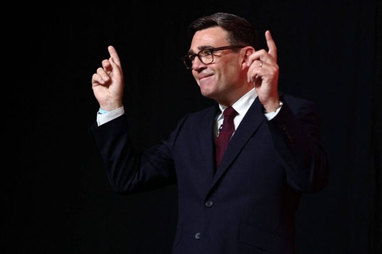 Andy Burnham gestures after being confirmed as the Labour Party's new leader and the country's next prime minister, during 'Labours Special Conference' in central London on July 17, 2026. (Photo by Henry Nicholls / POOL / AFP)