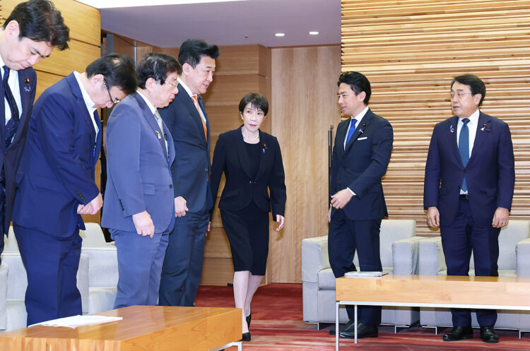 Japanese Prime Minister Sanae Takaichi, center, attends a cabinet meeting at her office in Tokyo on August 4, 2026. ( The Yomiuri Shimbun via AP Images )
