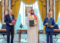 Turkish President Tayyip Erdogan, Saudi Crown Prince Mohammed bin Salman, and Pakistan's Prime Minister Shehbaz Sharif pose after signing a joint defence agreement in Mecca, Saudi Arabia, August 7, 2026. Saudi Press Agency/Handout via REUTERS