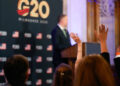 Journalists raise their hands to ask questions to United States Trade Representative Jamieson Greer during a press conference Thursday, Oct. 1, 2026, at the G20 Trade Ministerial in Milwaukee, Wis. (AP Photo/Kayla Wolf)