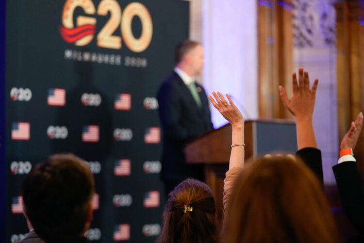 Journalists raise their hands to ask questions to United States Trade Representative Jamieson Greer during a press conference Thursday, Oct. 1, 2026, at the G20 Trade Ministerial in Milwaukee, Wis. (AP Photo/Kayla Wolf)